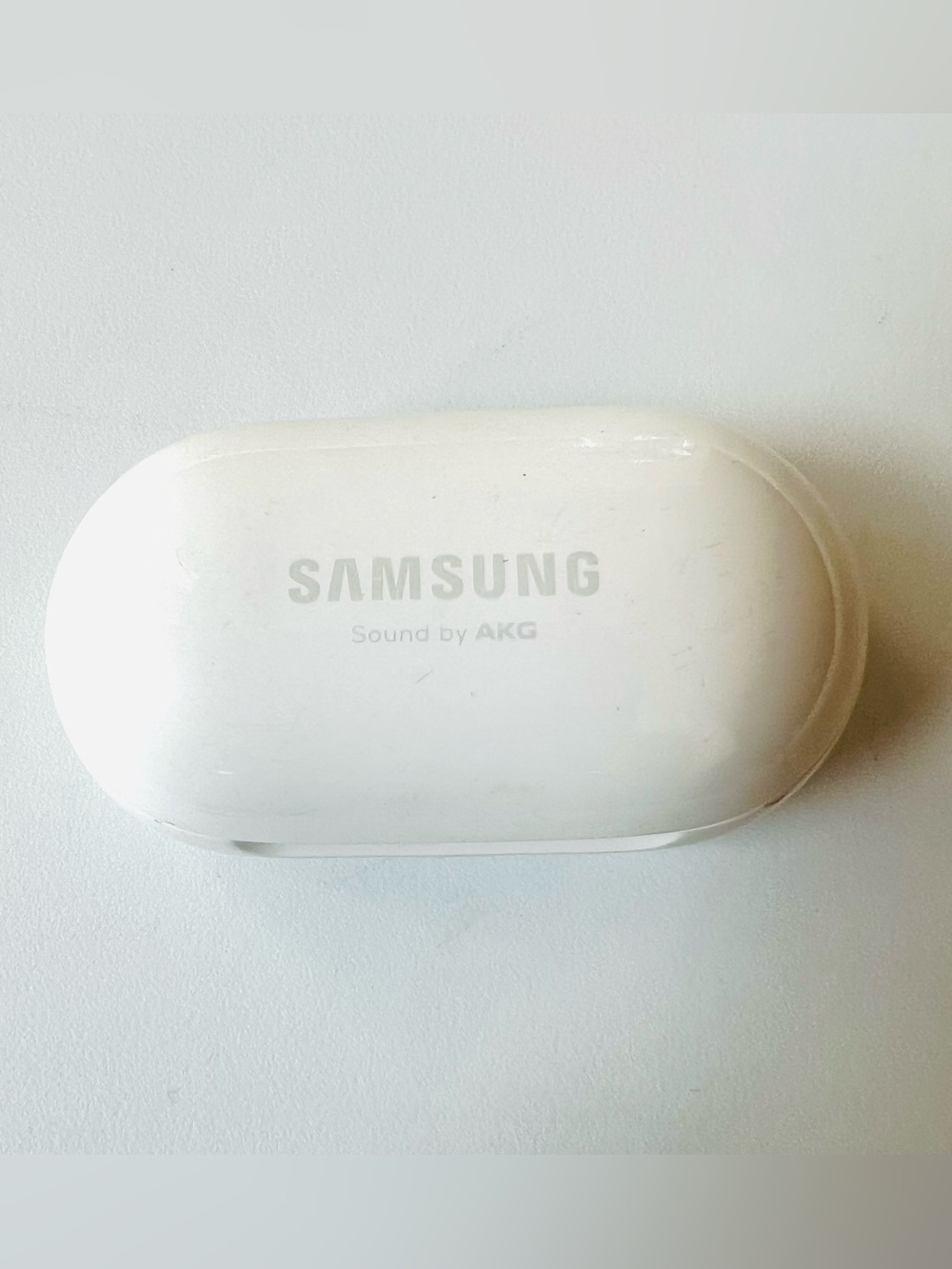 Samsung Galaxy SM-R170 Earbud Charging Case with Regulatory Markings in Working